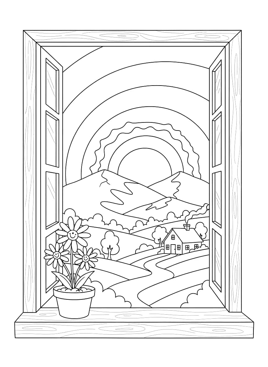 A sunset behind a mountain seen from a window in a country house.