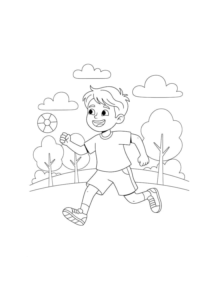 A young boy running with a smile.
